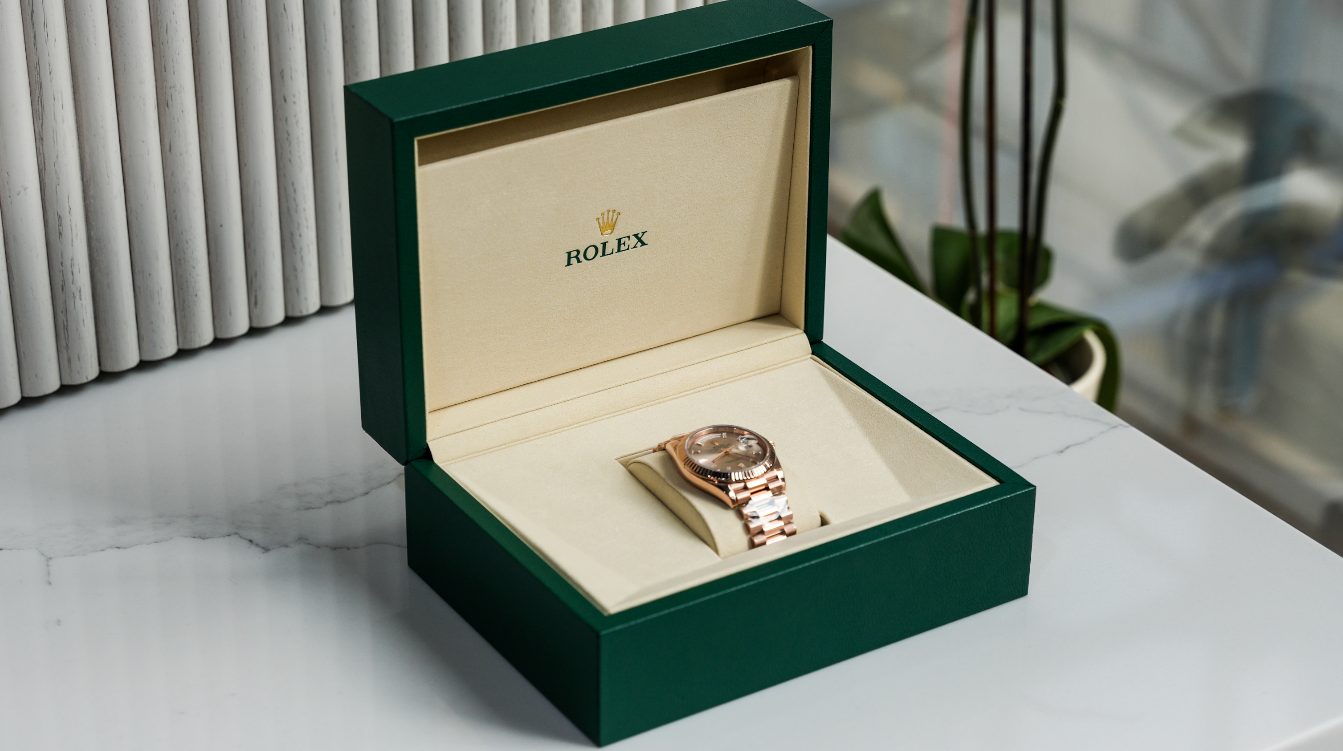 Day-Date 40 – 18k Everose Gold with Sundust Diamond Dial and President Bracelet Ref. 228235